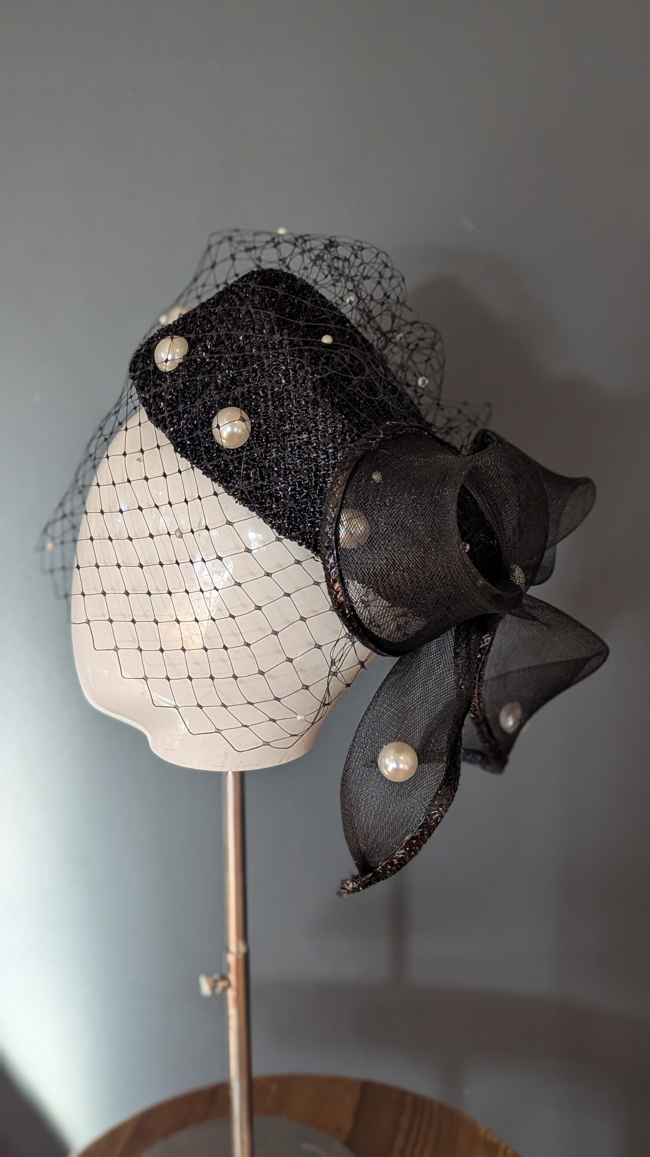 The Girl with the Black and Pearl Pill Box