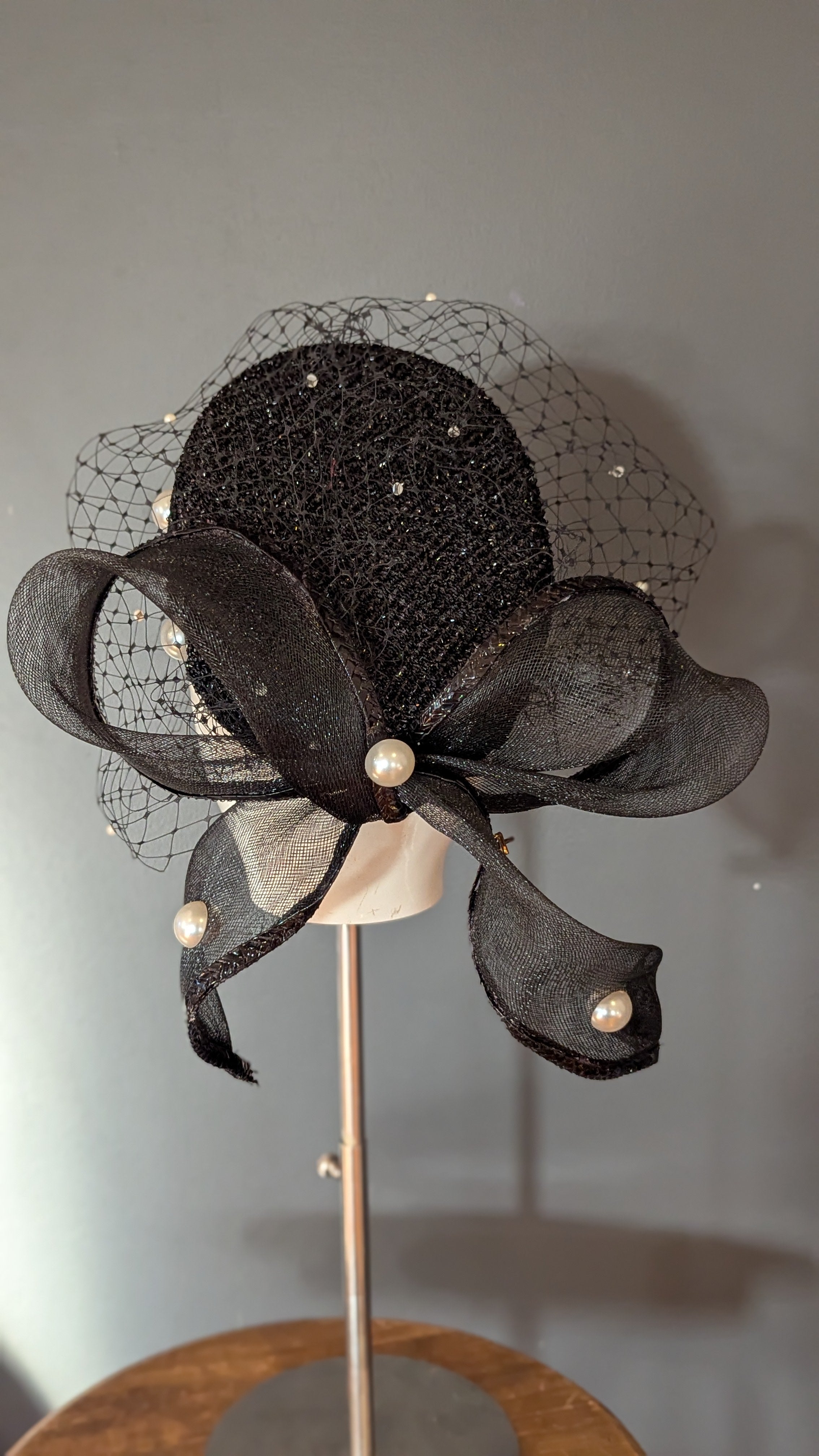 The Girl with the Black and Pearl Pill Box