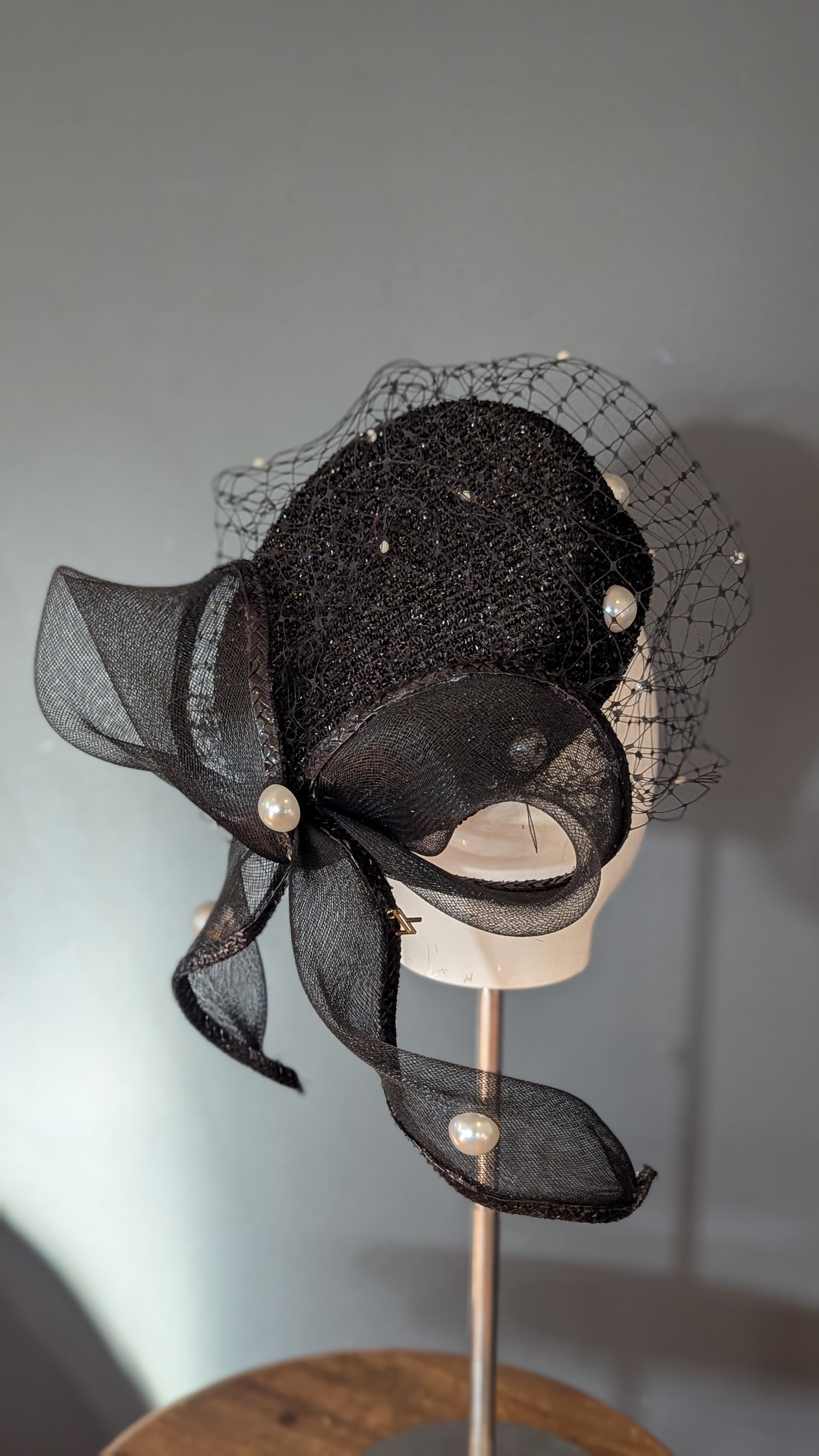 The Girl with the Black and Pearl Pill Box