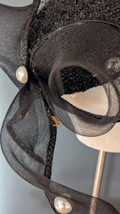 The Girl with the Black and Pearl Pill Box