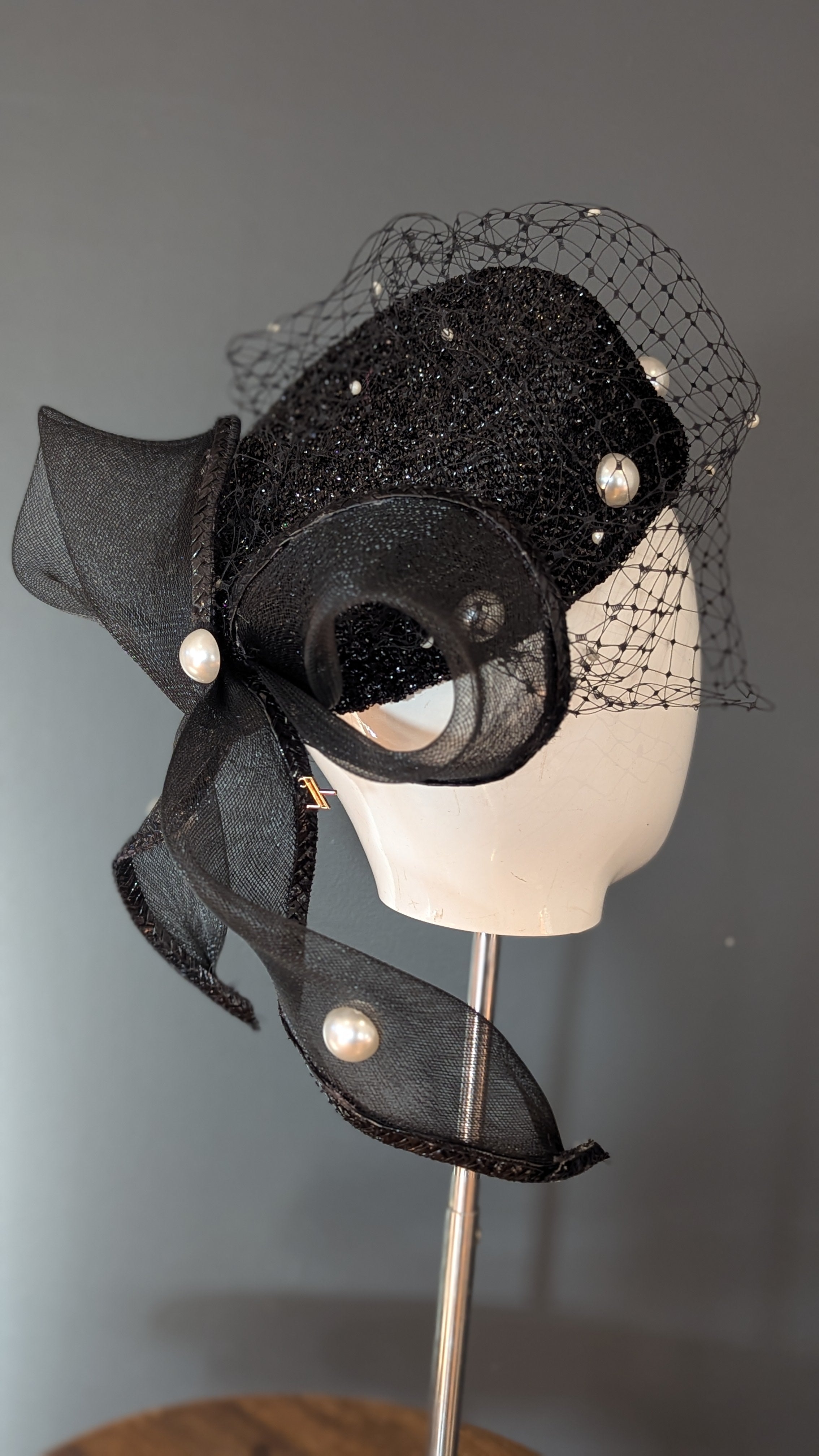 The Girl with the Black and Pearl Pill Box