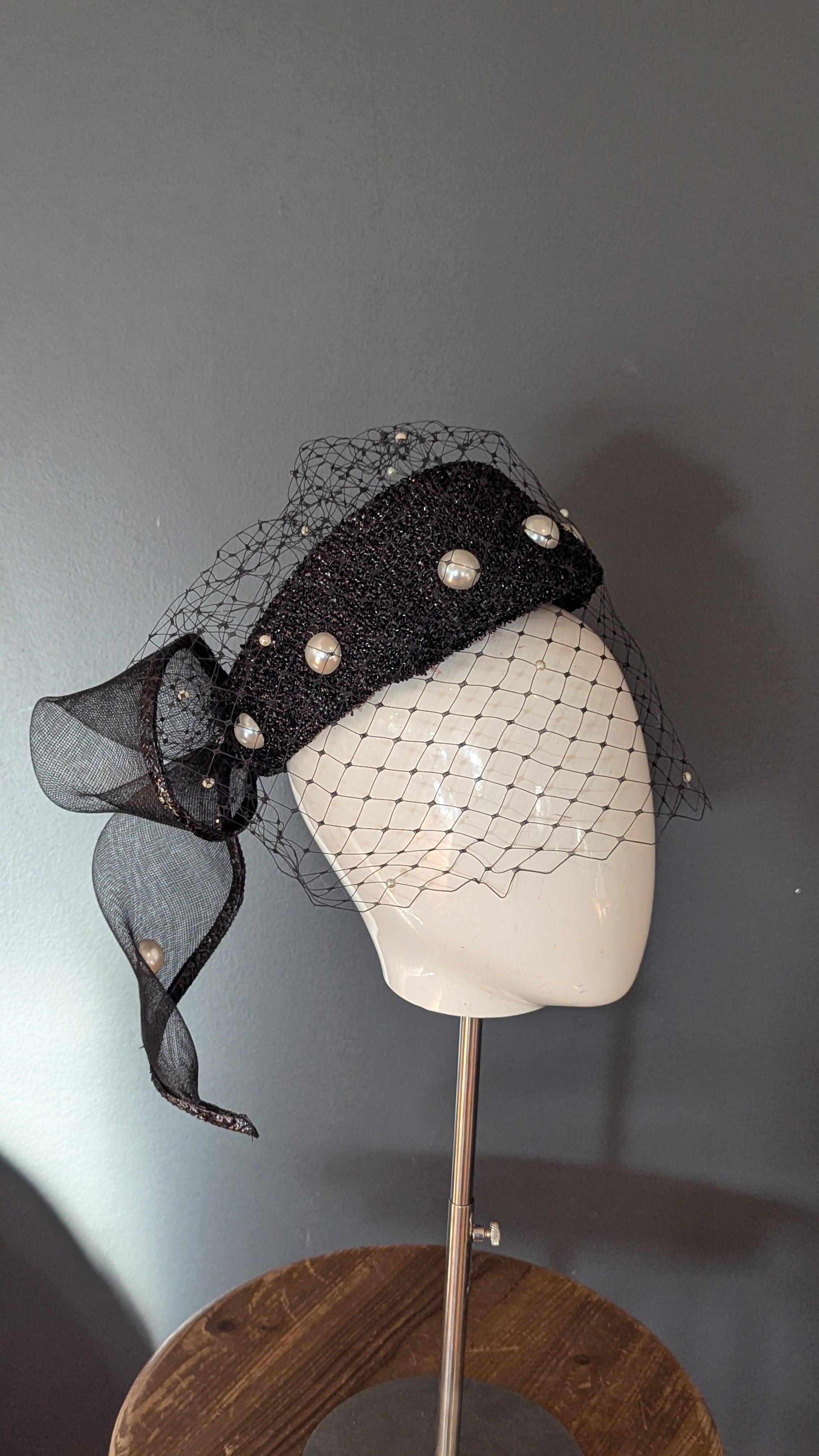 The Girl with the Black and Pearl Pill Box