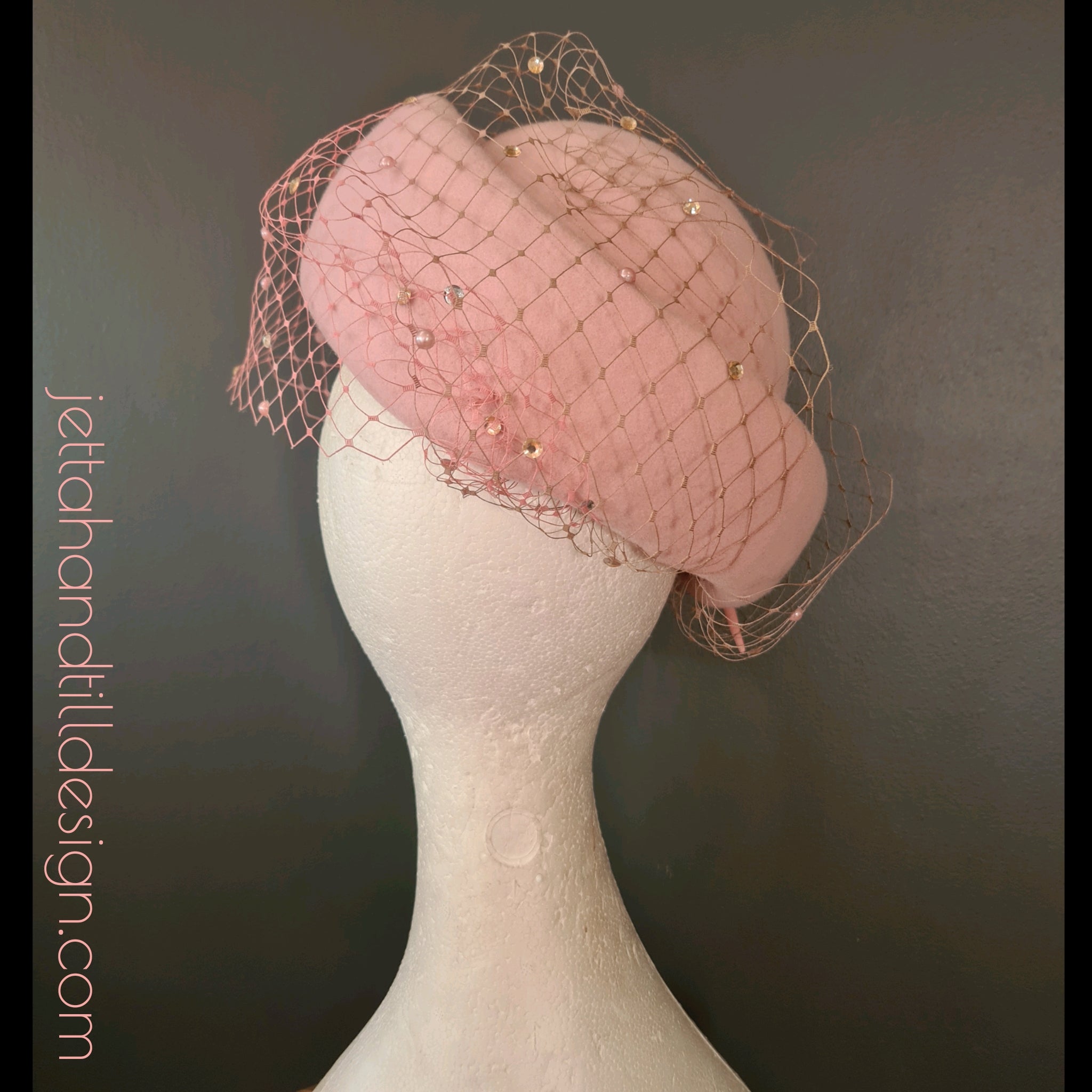 Powder pink felt vintage style piec with ombre veiling