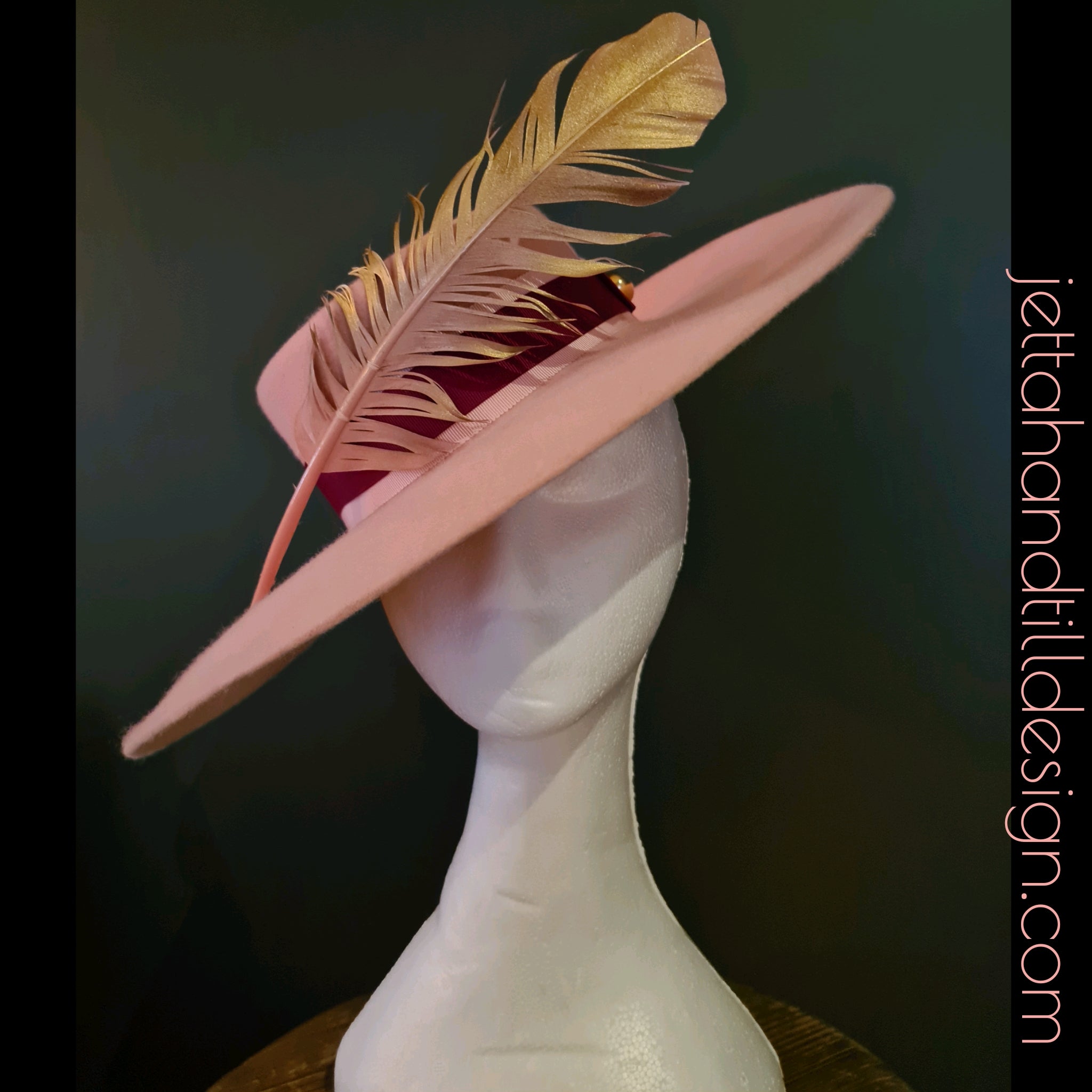 Pastel pink felt wide brim with feature feather