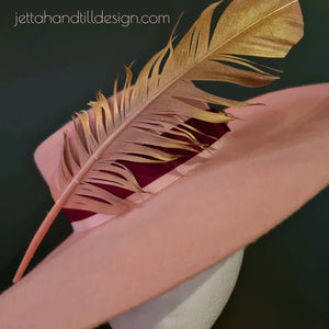 Pastel pink felt wide brim with feature feather
