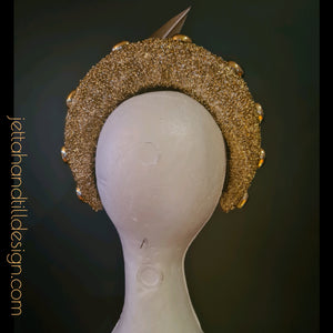 Gold sparkle and studded chunky band with floating feather